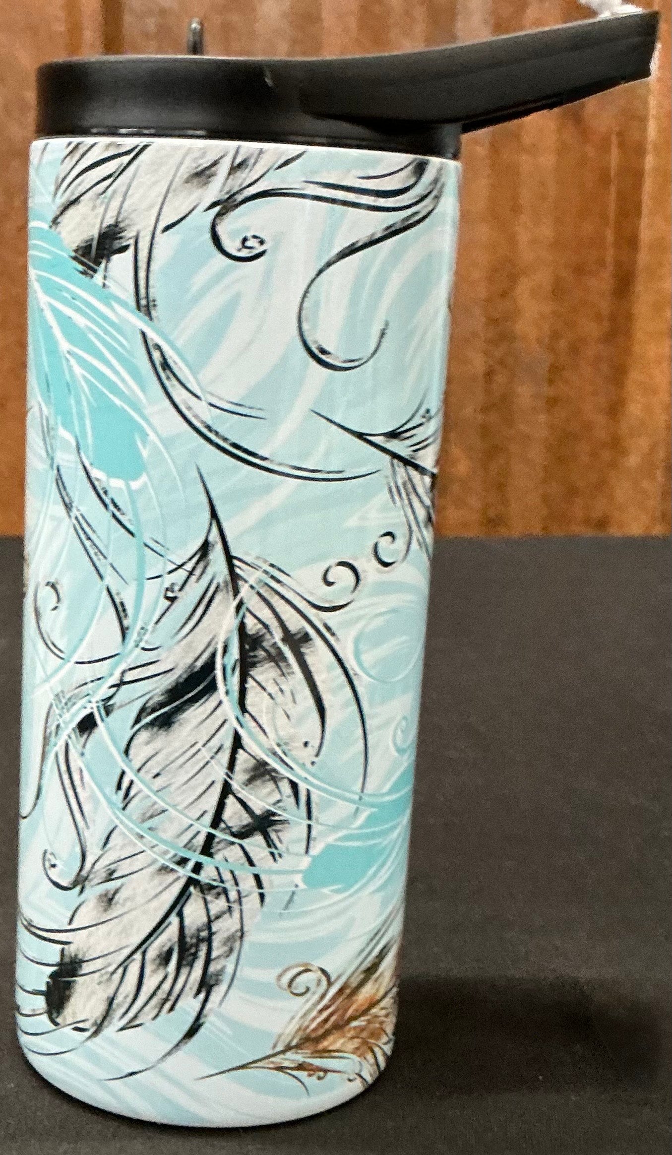 Feathers In The Wind